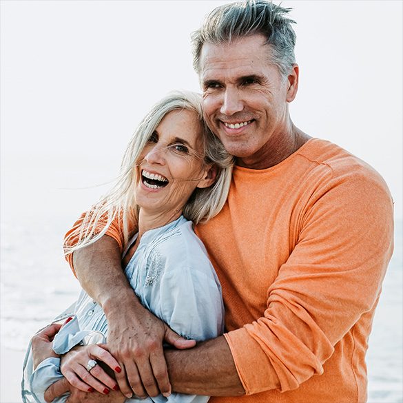 Medicare Insured Happy Couple by the Beach